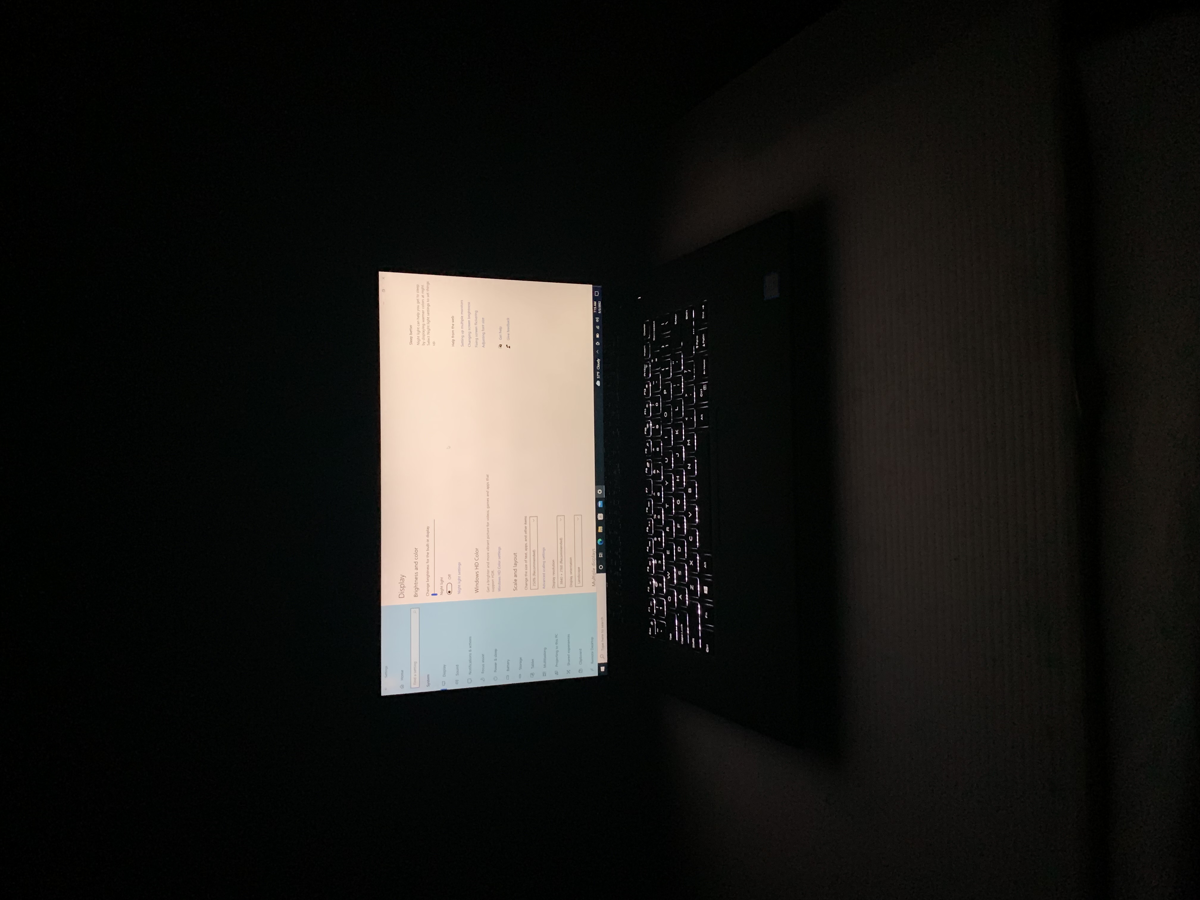 Dell XPS 15 9560 in the dark, showcasing its backlit keyboard